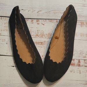 Black scalloped flats